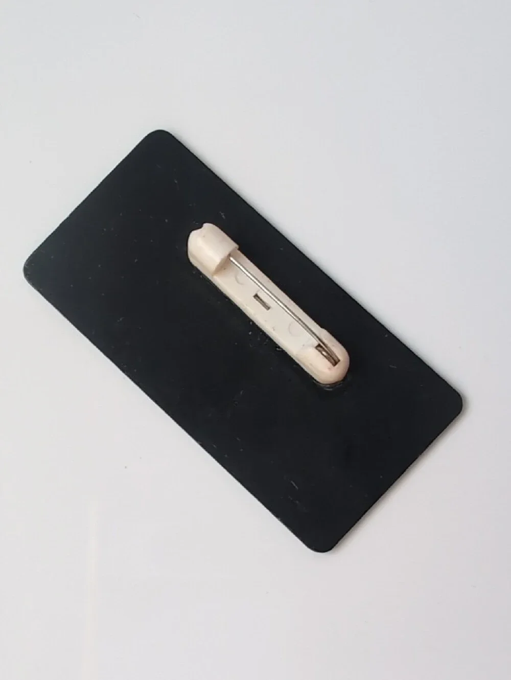 Hooters Gold Name Badge with Black Logo and Text